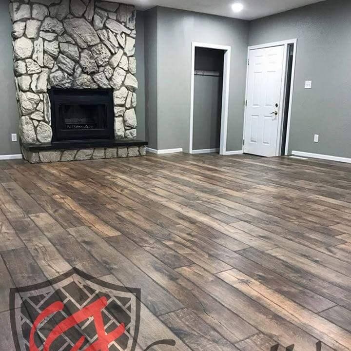 Living room with stone fireplace