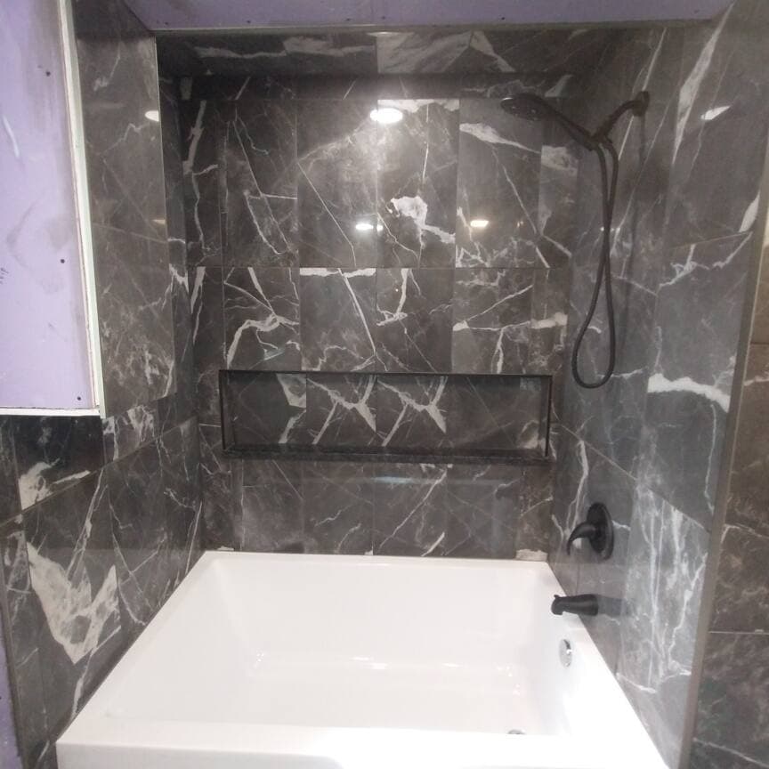 Black marble tub surround